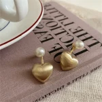 La Trendz Korean Statement Western Heart Shape Stud Earrings For Women